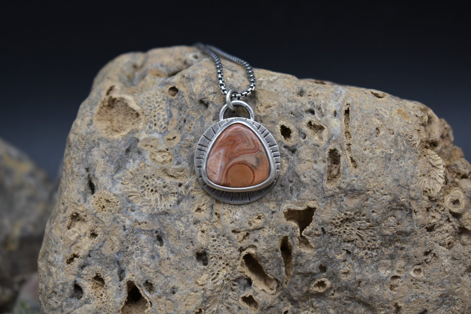 Orange Lake Superior agate set in sterling silver with a sunburst around the setting