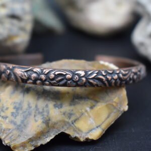 Handmade Copper Cuff Bracelet with a floral pattern and rustic patina finish