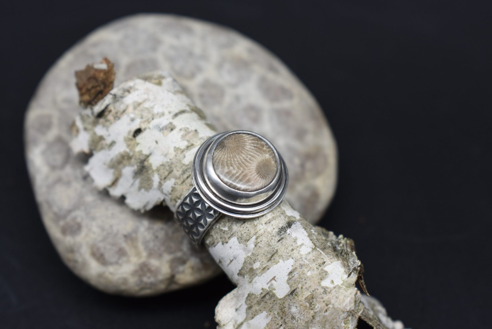 Round Petoskey Stone set in Sterling Silver with a wide textured band Size 5.5