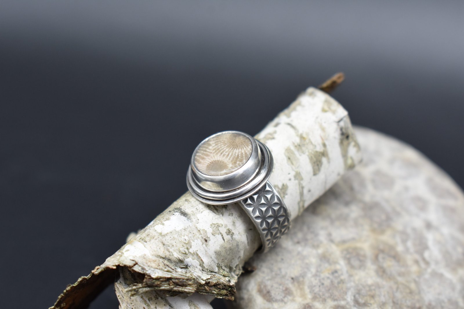 Round Petoskey Stone set in Sterling Silver with a wide textured band Size 5.5