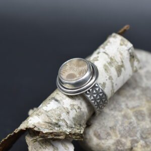 Round Petoskey Stone set in Sterling Silver with a wide textured band Size 5.5